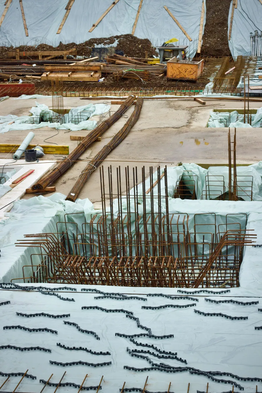 Reinforcing steel and formwork laid out at a building foundation site
